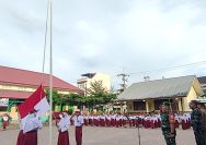 Babinsa Koramil 04/Siantar Barat Hadiri Upacara Bendera di SD 122337 Adam Malik