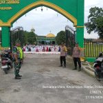 Babinsa dan Bhabinkamtibmas Bersinergi Amankan Sholat Idul Adha 1447 H di Bah Jambi.