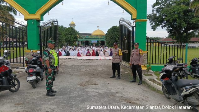 Babinsa dan Bhabinkamtibmas Bersinergi Amankan Sholat Idul Adha 1447 H di Bah Jambi.