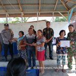 Babinsa dan Bhabinkamtibmas Kompak Dampingi Penyaluran BLT-DD di Nagori Pokkan Baru.