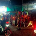 Babinsa Koramil 08/Sungai Geringging Laksanakan Pengamanan Pawai Obor Sambut Tahun Baru Islam 1 Muharram 1448 H.