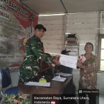 Babinsa Koramil 14/Raya Hadiri Penyaluran BLT di Nagori Bahbolon, Warga Terima Bantuan Enam Bulan Sekaligus.