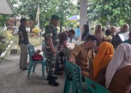 Pengamanan Humanis Babinsa Warnai Penyaluran Bantuan Pangan di Kantor Camat Dolok Batu Nanggar