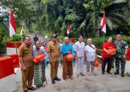 Jembatan Merah Putih Resmi Dibuka, Koramil 11/Girsang Sipangan Bolon Hadirkan Akses Baru dan Tebar Kepedulian untuk Lansia.