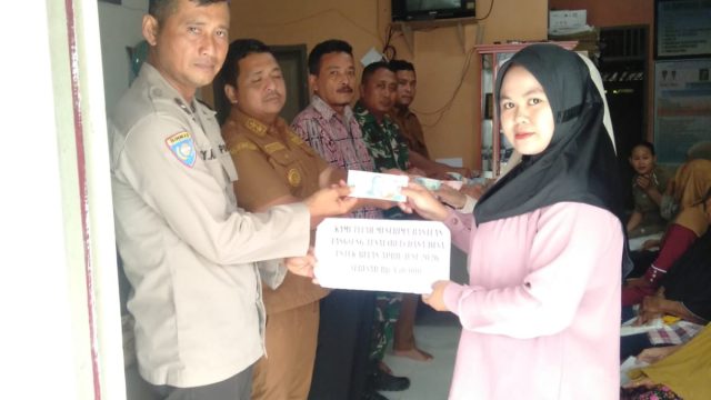 Babinsa dan Bhabinkamtibmas Kawal Penyaluran BLT Dana Desa di Simalungun, Pastikan Bantuan Tepat Sasaran.